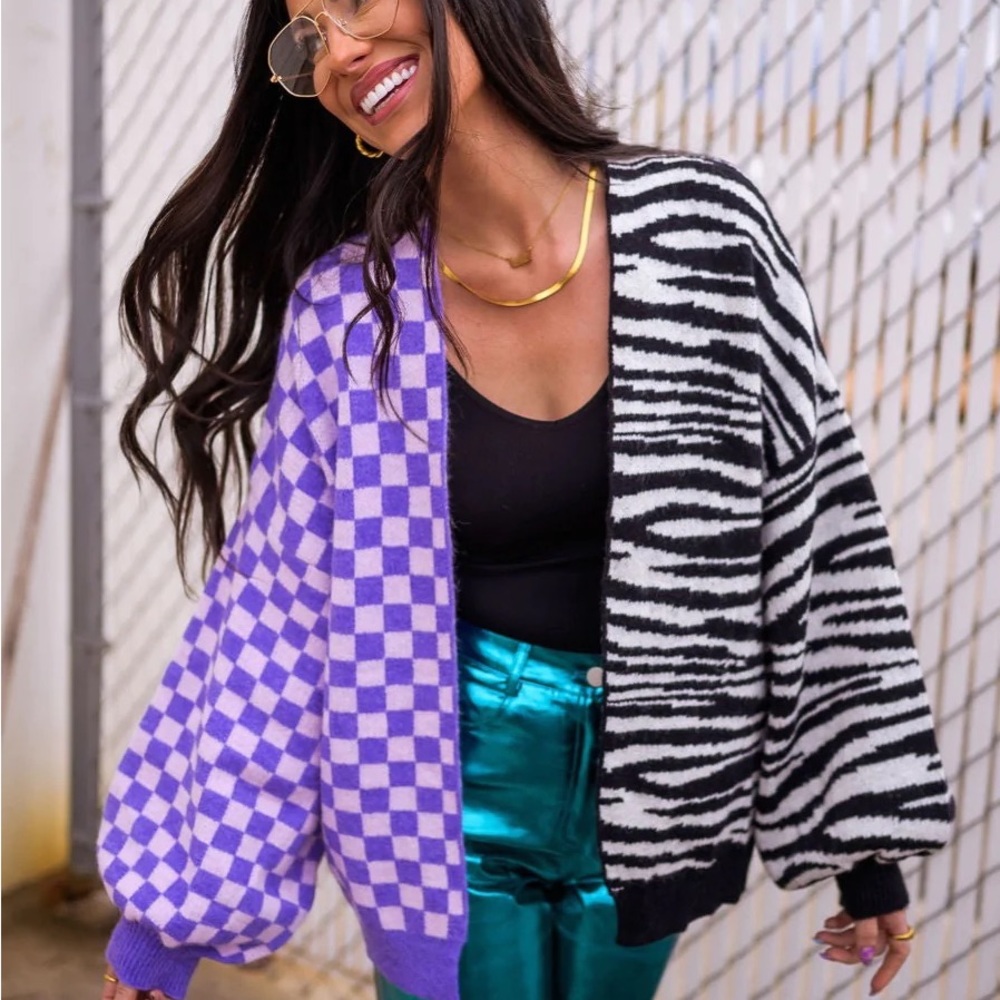 Dressed in Lala half and half sweater THIS IS SOLD OUT ON THEIR WEBSITE